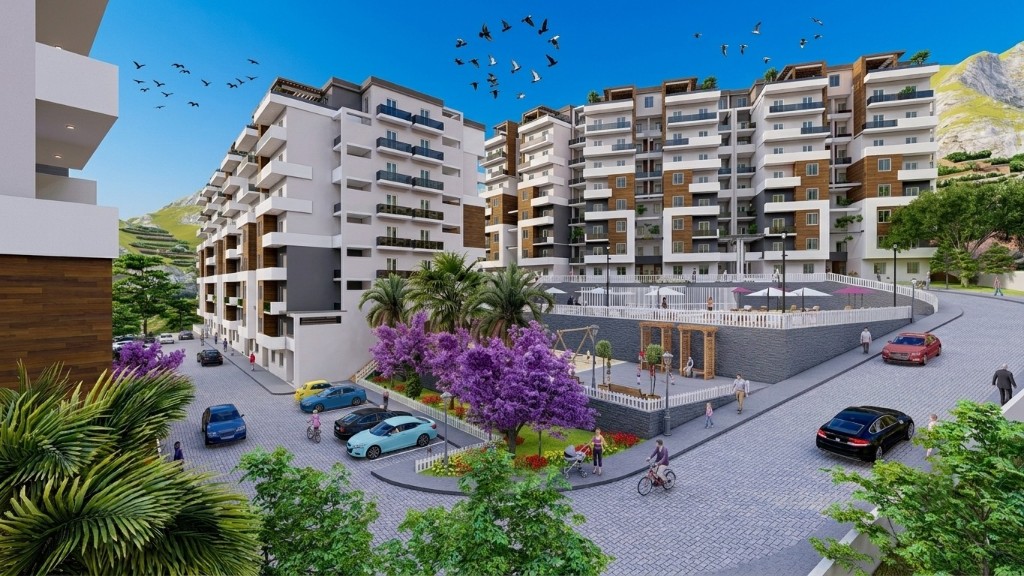 Vue d'ensemble avec piscines et espaces verts